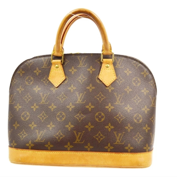 LOUIS VUITTON Alma Monogram Handbag - Picture 1 of 9